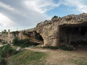 Cave Dwellings And Ancient Rock Church In Gravina Di Matera (Matera Canyon), Basilicata Cave Dwellings And Ancient Rock Church In Gravina Di Matera (Matera Canyon), Basilicata