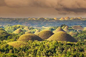 <b class=qtipBold><figcaption>The Chocolate Hills</figcaption></b><br>The Chocolate Hills are a unique geological formation in the Bohol, Philippines. Taken during sunset.<br><em>© Afriandi</em> The Chocolate Hills