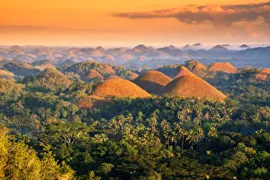 <b class=qtipBold><figcaption>The Chocolate Hills in the morning</figcaption></b><br>The Chocolate Hills are a unique geological formation in the Bohol, Philippines. Taken during sunset.<br><em>© Afriandi</em> The Chocolate Hills in the morning