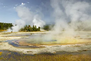 Chromatic Spring in Upper Geyser Basin on sunny day, Yellowstone National Park, Wyoming Chromatic Spring in Upper Geyser Basin on sunny day, Yellowstone National Park, Wyoming