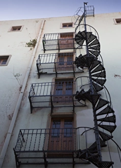 <b class=qtipBold><figcaption>Circular stairs on old building</figcaption></b><br><em>© Derek E Rothchild Photography</em> Circular stairs on old building