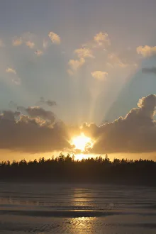 Clouds Are Backlit By The Sun At Sunset At Incinerator Rock Area Of Long Beach In Pacific Rim National Park Near Tofino Clouds Are Backlit By The Sun At Sunset At Incinerator Rock Area Of Long Beach In Pacific Rim National Park Near Tofino