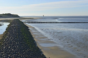 Coastal protection wall made of stones on the western beach, Spiekeroog, East Frisia Coastal protection wall made of stones on the western beach, Spiekeroog, East Frisia
