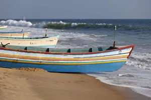 Colorful fishing boats on the beach, Somatheeram Beach, Malabarian Coast, Malabar, Kerala Colorful fishing boats on the beach, Somatheeram Beach, Malabarian Coast, Malabar, Kerala