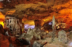Colourfully, illuminated Hang Sung Sot cave, Surprise Cave, Cave of Awe, a UNESCO World Heritage Site Colourfully, illuminated Hang Sung Sot cave, Surprise Cave, Cave of Awe, a UNESCO World Heritage Site