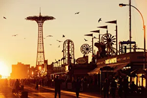 The Coney Island Boardwalk at sunset, Brighton Beach, Brooklyn, New York City, NY, USA The Coney Island Boardwalk at sunset, Brighton Beach, Brooklyn, New York City, NY, USA