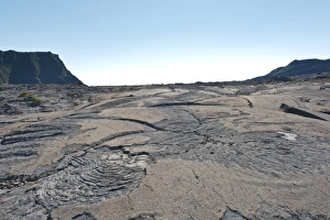 Cooled lava flow at the foot of the Piton de la Fournaise volcano, ropy lava Cooled lava flow at the foot of the Piton de la Fournaise volcano, ropy lava