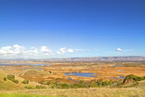 <b class=qtipBold><figcaption>Coyote Hill</figcaption></b><br>Coyote Hills Regional Park with blue sky.<br><em>© Phoo Chan</em> Coyote Hill