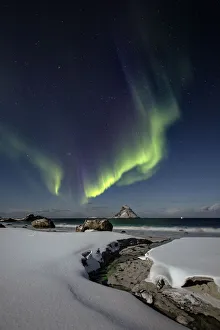<b class=qtipBold><figcaption>The creek</figcaption></b><br>This small rock is called 'BleiksAžya' Bleik island, just off shore from the bigger AndAžya island. In this photo, there was a full moon, lighten up the waves and the snow. Photographing the aurora borealis when the moon is bright like this, makes the colors from the auroras quite faint. But I still managed to get some decent colors.<br><em>© Vesteralen Photo vesteraling@gmail.com</em> The creek