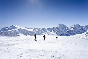Cross-country skiers during the descent from Hintere Schoentaufspitze Mountain Cross-country skiers during the descent from Hintere Schoentaufspitze Mountain
