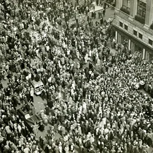 Crowd of people on street, news media broadcasting, (B&W), (Aerial view) Crowd of people on street, news media broadcasting, (B&W), (Aerial view)
