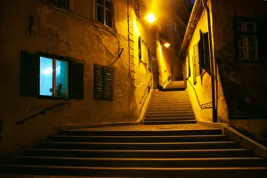 Curved narrow street at night, Sibiu, Romania Curved narrow street at night, Sibiu, Romania