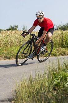 Cyclist, 44 years, riding a racing cycle, Winterbach, Baden-Wurttemberg, Germany Cyclist, 44 years, riding a racing cycle, Winterbach, Baden-Wurttemberg, Germany