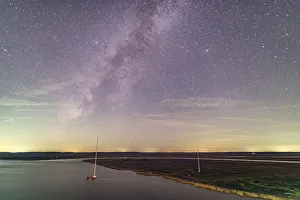 <b class=qtipBold><figcaption>The Dawho River and the Milky Way</figcaption></b><br>The Dawho River and the Milky Way.<br><em>© ROBERT LOE</em> The Dawho River and the Milky Way