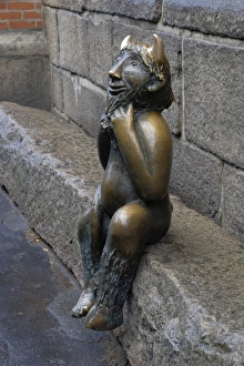 Devils figure sitting on the Devils Stone, St. Marys Church, Lubeck, Schleswig-Holstein Devils figure sitting on the Devils Stone, St. Marys Church, Lubeck, Schleswig-Holstein