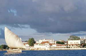 <b class=qtipBold><figcaption>Dhow and Coastal Buildings Behind</figcaption></b><br>Stone Town, Zanzibar Island, Tanzania Dhow and Coastal Buildings Behind