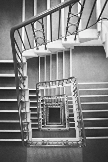 Directly above shot of square spiral staircase Directly above shot of square spiral staircase