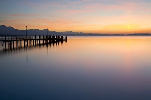 Dock in the evening light near Chieming on Lake Chiemsee, Bavaria, Germany, Europe Dock in the evening light near Chieming on Lake Chiemsee, Bavaria, Germany, Europe