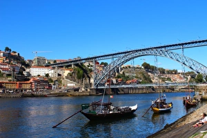 Dom Luis I bridge and rabelo boats in Porto Dom Luis I bridge and rabelo boats in Porto