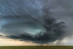 Dramatic looking super-cell storm cloud with cloud to ground lightning. Colorado. USA Dramatic looking super-cell storm cloud with cloud to ground lightning. Colorado. USA