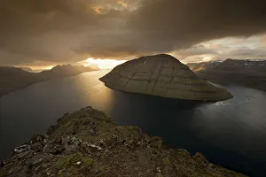 Dramatic mood lighting over the islands of Kalsoy, Kunoy and Bordoy, Borooy, Norooyar Dramatic mood lighting over the islands of Kalsoy, Kunoy and Bordoy, Borooy, Norooyar