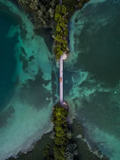 Drone shot looking down on a bridge crossing over lake Konstanz, Bavaria, Germany Drone shot looking down on a bridge crossing over lake Konstanz, Bavaria, Germany