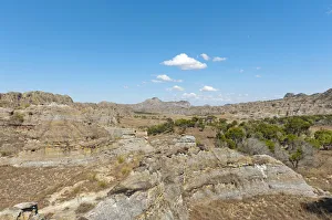 Toliara Gallery: Dry and wide erosional landscape with rocks and trees, Isalo National Park, at Ranohira, Madagascar