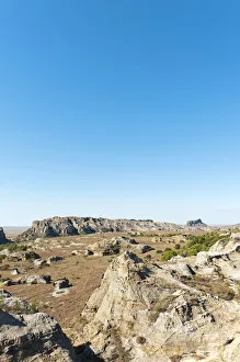 Toliara Gallery: Dry and wide erosional landscape with rocks and trees, Isalo National Park, at Ranohira, Madagascar