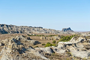 Toliara Gallery: Dry and wide erosional landscape with rocks and trees, Isalo National Park, at Ranohira, Madagascar