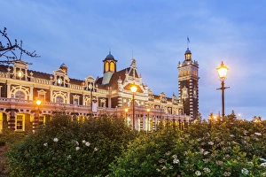 Dunedin Railway Station, illuminated at twilight, Otago, South Island, New Zealand Dunedin Railway Station, illuminated at twilight, Otago, South Island, New Zealand
