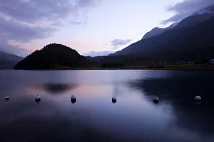Early morning on Lake Champferersee, St. Moritz, Engadin, canton of Grisons, Switzerland Early morning on Lake Champferersee, St. Moritz, Engadin, canton of Grisons, Switzerland