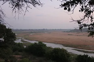 Early morning mist rising over the floodplain of the Letaba River in the Kruger National Early morning mist rising over the floodplain of the Letaba River in the Kruger National