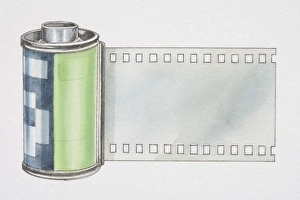 Edge of 35mm film roll extending out of its plastic case Edge of 35mm film roll extending out of its plastic case