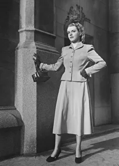 Elegant woman standing at Sutton Place NYC, (B&W) Elegant woman standing at Sutton Place NYC, (B&W)