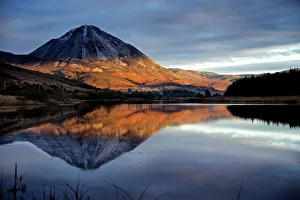 <b class=qtipBold><figcaption>Errigal</figcaption></b><br>The last light of the day highlights the autumnal hues on Errigal mountain in Donegal, Ireland<br><em>© Trevor Cole 2013</em> Errigal