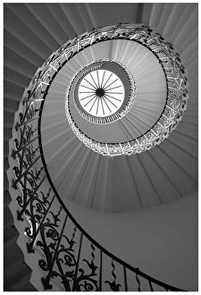 <b class=qtipBold><figcaption>Eye of the Spiral</figcaption></b><br>Monochrome image of spiral staircase with a glass ceiling in the pinnacle<br><em>© John F. Wenceslao, MD</em> Eye of the Spiral