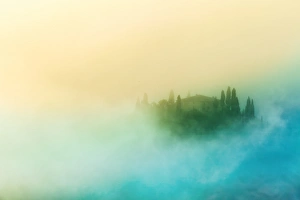 Farmhouse in the morning fog in Tuscany, Italy Farmhouse in the morning fog in Tuscany, Italy