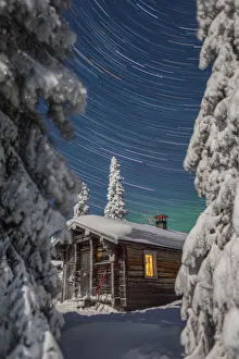 Finnish Wilderness cabin on a clear winters night Finnish Wilderness cabin on a clear winters night