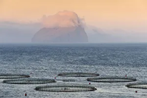 Fish farm, clouds and sea, Koltur, Utoyggjar, Faroe Islands, Denmark Fish farm, clouds and sea, Koltur, Utoyggjar, Faroe Islands, Denmark