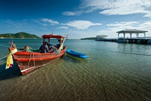 Fishing boat and the white pavilion of Koh Sichang Fishing boat and the white pavilion of Koh Sichang