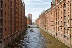 Fleet in the historic Speicherstadt warehouse district of Hamburg, Hamburg, Germany Fleet in the historic Speicherstadt warehouse district of Hamburg, Hamburg, Germany