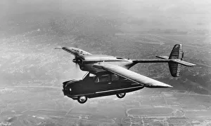 <b class=qtipBold><figcaption>Flying Car</figcaption></b><br>A ConVairCar, Model 118 flying car during a test-flight, California, November 1947. The hybrid vehicle was designed by Theodore P. Hall for the Consolidated Vultee Aircraft Company of San Diego, California, but never went into production. (Photo by FPG/Hulton Archive/Getty Images)<br><em>© 2004 Getty Images</em> Flying Car