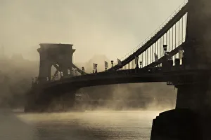 <b class=qtipBold><figcaption>Foggy Chain Bridge, Budapest</figcaption></b><br>Tonnaja Travel Photography, 623394954<br><em>© @Anan Chaoroenkal</em> Foggy Chain Bridge, Budapest