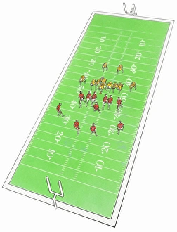Football game in progress on rectangular field, elevated view Football game in progress on rectangular field, elevated view