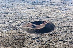 Formica Leo, a small ash crater at the Piton de la Fournaise volcano, cooled lava flow Formica Leo, a small ash crater at the Piton de la Fournaise volcano, cooled lava flow