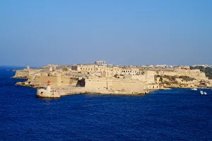 Fort Ricasoli at Dusk, Seen from Valletta, Malta Fort Ricasoli at Dusk, Seen from Valletta, Malta