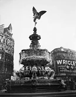 Frosty Eros; The Eros statue at Piccadilly Circus covered in icicles during a cold snap Frosty Eros; The Eros statue at Piccadilly Circus covered in icicles during a cold snap