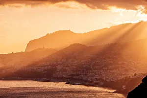 Travel Imagery Gallery: Funchal city skyline and Madeira island landscape at sunset, Portugal