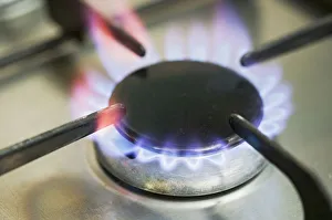 Gas cooker hob, close up of one ring lit up Gas cooker hob, close up of one ring lit up
