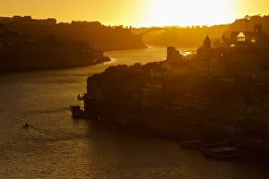 General view of Douro river and city of Oporto al sunset. Porto (Oporto), Portugal General view of Douro river and city of Oporto al sunset. Porto (Oporto), Portugal
